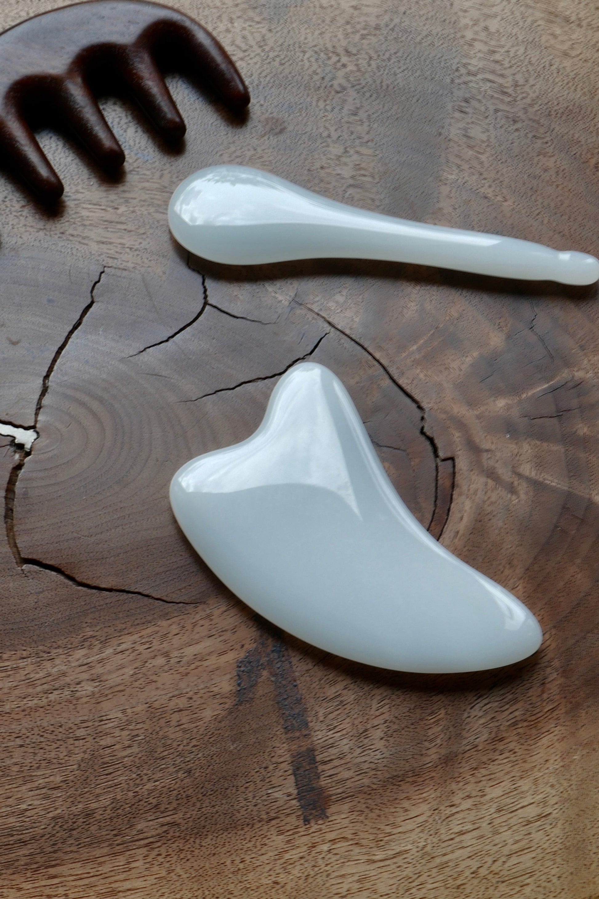 Gua sha set on wooden chair