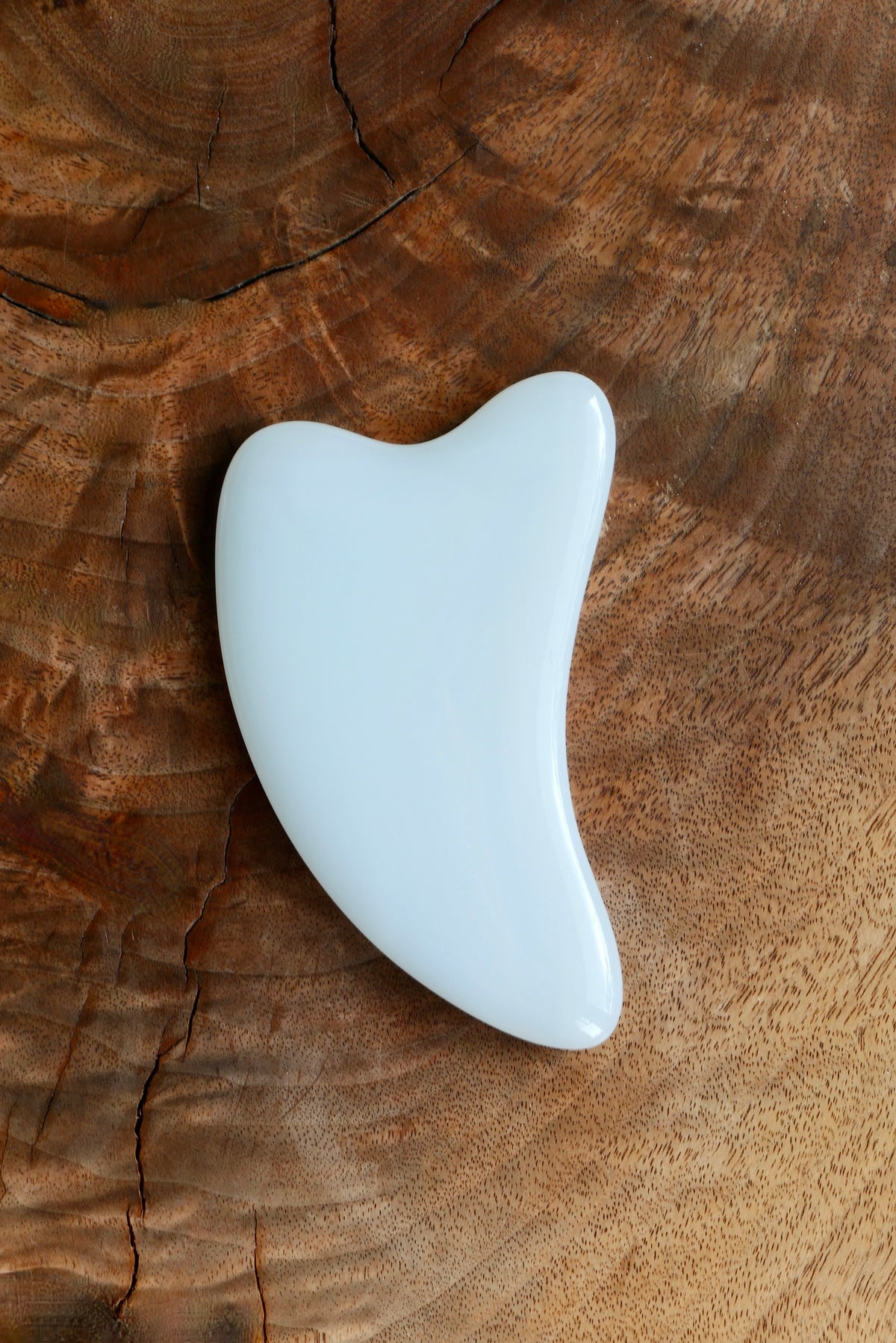 Front view of a jade gua sha